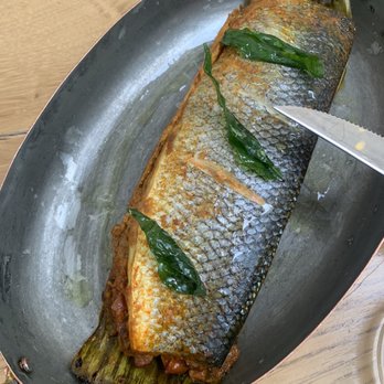 ROOP Chicago Innovative Indian Restaurant & Cocktail Bar - WHOLE SEA BASS WRAPPED IN BANANA LEAF - Indian Near Me - Chicago, Illinois
