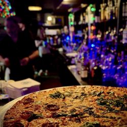 Pepperoni pizza while sitting at the bar