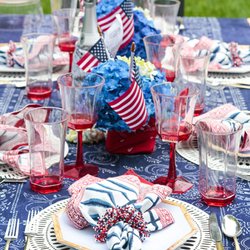 Kim Seybert - A Patriotic Tablesetting featuring Kim Seybert's Fiesta reversible Placemats, Carnival Napkin Rings in Red, White and Blue