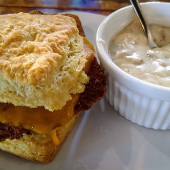 Stewart's Bistro - Fried chicken and cheese biscuit with sausage gravy on the side (YUMMO pairing)! - Coffee & Tea Near Me - Wake Forest, North Carolina Stewart's Bistro - Fried chicken and cheese biscuit with sausage gravy on the side (YUMMO pairing)! - Coffee & Tea Near Me - Wake Forest, North Carolina