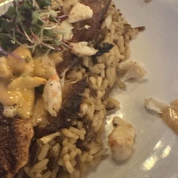 Federal American Grill - Trout over wild rice with a Cajun lobster sauce - New American Near Me - Oak Ridge North, Texas