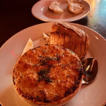 SWeL Restaurant - Scallop appetizer with fresh bread. - New American Near Me - Seattle, Washington SWeL Restaurant - Scallop appetizer with fresh bread. - New American Near Me - Seattle, Washington