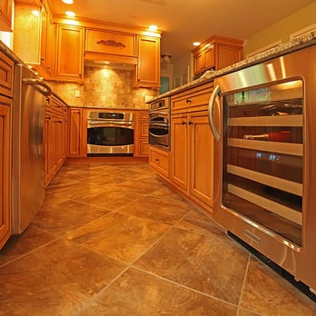 American Custom Builders - kitchen with stainless steel appliances - General Contractors Near Me American Custom Builders - kitchen with stainless steel appliances - General Contractors Near Me