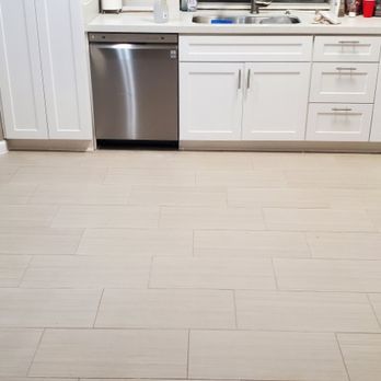 A.X.D Solutions - New tile and baseboards - Flooring Near Me