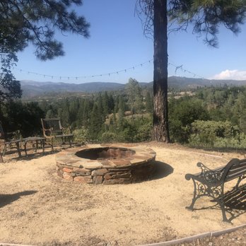 Yosemite Cellars - The back fire pit with an incredible view - Wine Tasting Room Near Me - Groveland, California