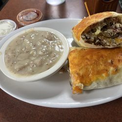 GG's Cafe - Egg and meat burrito with a side of sausage gravy
