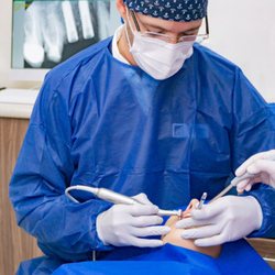 Peninsula Dental Group - Part of our team is specialist in Periodontics and dental implants.