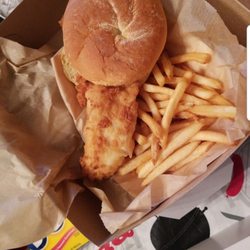 The Original Seafood - Fish sandwich with french fries, fresh cole slaw, pickles and tartersauce.
