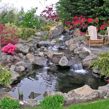 Precision Landscape Services Inc - a water feature in a garden - Landscaping Near Me - Portland, Oregon Precision Landscape Services Inc - a water feature in a garden - Landscaping Near Me - Portland, Oregon