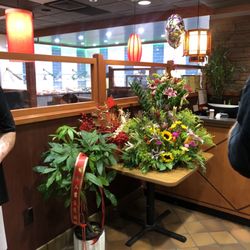 Hi Pot - Raw Buffet Bar in background and host/cashier area in foreground.