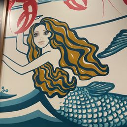 This is my mermaid wife. She supports our household by holding the specials of the day menu. So proud of her! This is my mermaid wife. She supports our household by holding the specials of the day menu. So proud of her!