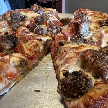 Vino's Pizza - Sorry a couple pieces were missing already - Pizza Near Me - Carson City, Nevada