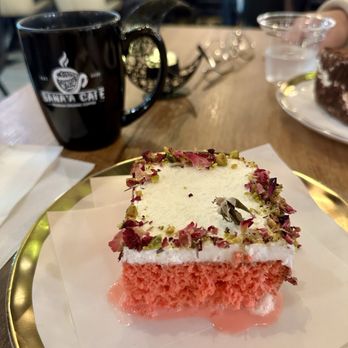 Sana'a Cafe - Rose milk cake and Yemeni tea in the background - Coffee & Tea Near Me - Elk Grove, California