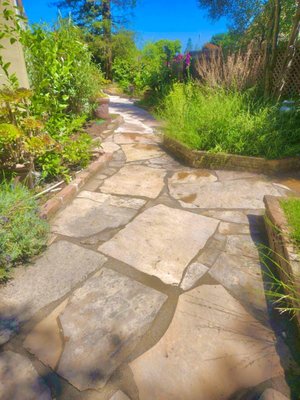 Natural stone walkway - This client called us after 12 years of doing their driveway. It just goes to show, people don’t forget good work. We were happy to use natural stone they have had sitting in their backyard. With a little pressure washing and scrubbing they were good as new. Happy to say our client loved the final product. Natural stone walkway - This client called us after 12 years of doing their driveway. It just goes to show, people don’t forget good work. We were happy to use natural stone they have had sitting in their backyard. With a little pressure washing and scrubbing they were good as new. Happy to say our client loved the final product.