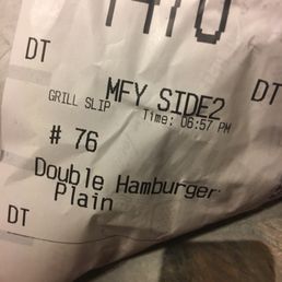 a bag of hamburgers on a counter a bag of hamburgers on a counter