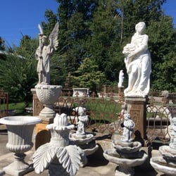 Antiques & Accents - Classical yard art.