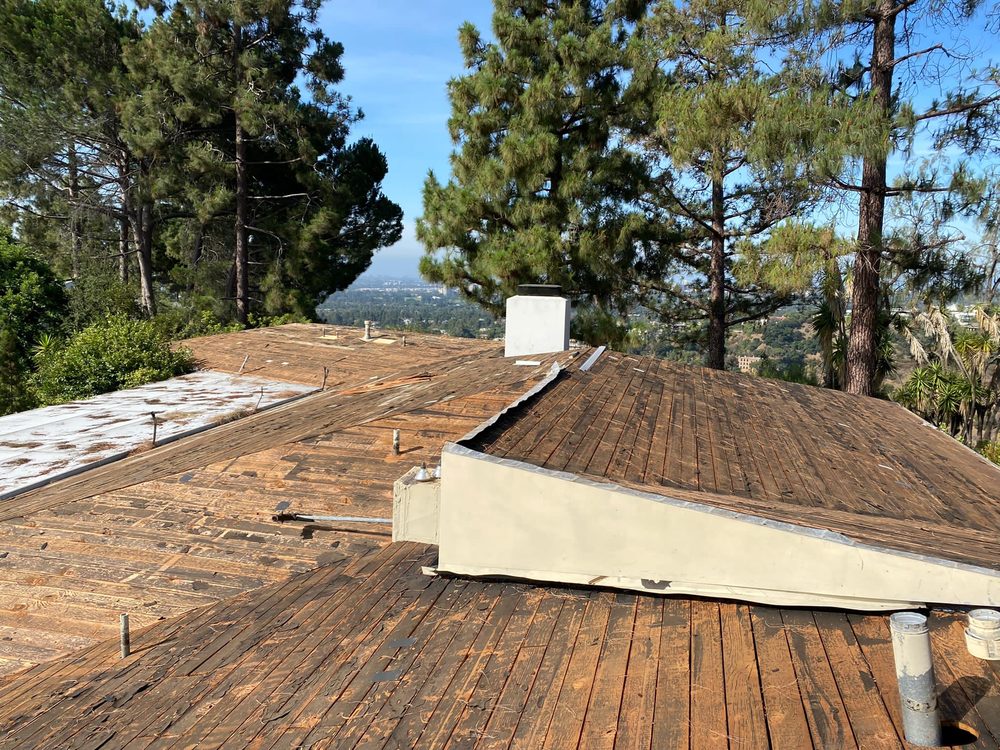 Slide of United Frontier Roofing