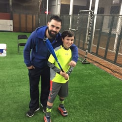 Inside the Park - Indoor Batting Cages - Coach and William putting some work in.
