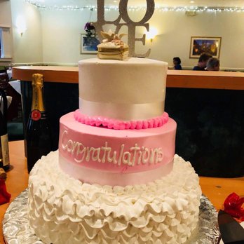 Mary's Bakery - a pink and white cake - Bakeries Near Me - Paterson, New Jersey