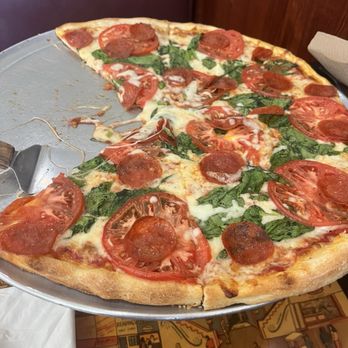 Rudi’s Pizza - Pepperoni pizza with fresh tomato and spinach - Pizza Near Me - Boynton Beach, Florida Rudi’s Pizza - Pepperoni pizza with fresh tomato and spinach - Pizza Near Me - Boynton Beach, Florida