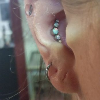 Blood Diamond Tattoo Studio - Just got this lovely opal piercing. - Piercing Near Me - Pasadena, Maryland