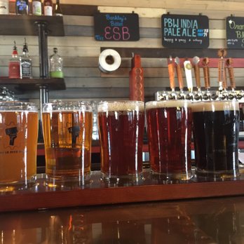 Paducah Beer Werks - Flight and smiles - Pizza Near Me - Paducah, Kentucky Paducah Beer Werks - Flight and smiles - Pizza Near Me - Paducah, Kentucky