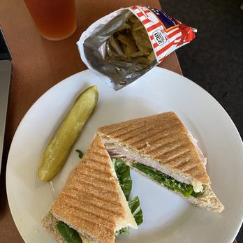 Little Garden Cafe - Turkey sandwich (i asked for no tomato) chips, pickle (perfect flavor!) and a black tea. - American Near Me - Spokane, Washington Little Garden Cafe - Turkey sandwich (i asked for no tomato) chips, pickle (perfect flavor!) and a black tea. - American Near Me - Spokane, Washington