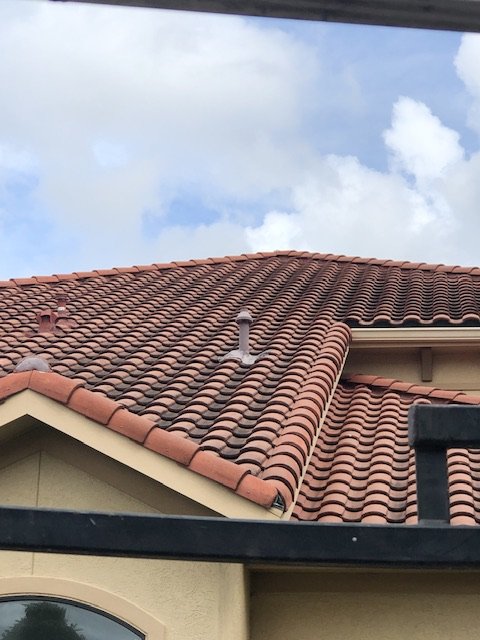 Slide of Ez roofing and painting