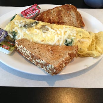 Daddy Maxwell's Diner & Cafe - Omelette with mushrooms, spinach, fresh feta cheese and wheat toast - Breakfast & Brunch Near Me - Williams Bay, Wisconsin Daddy Maxwell's Diner & Cafe - Omelette with mushrooms, spinach, fresh feta cheese and wheat toast - Breakfast & Brunch Near Me - Williams Bay, Wisconsin