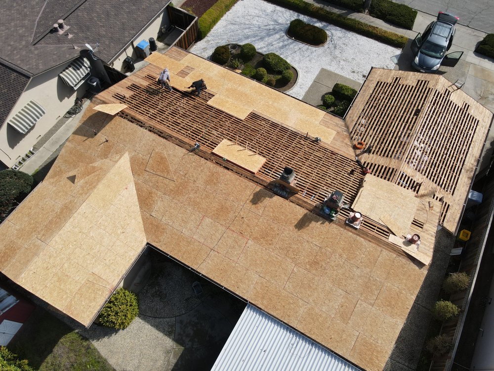 Slide of ELM Roofing Contractors