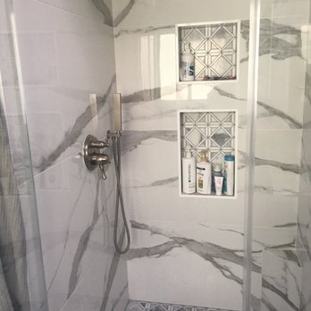 Amce Engineers - After - all new tile, new hand held shower and stable head was raised up, new soap niches, frameless door - Architects Near Me - Downey, California