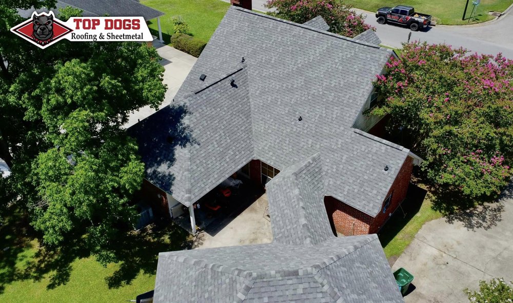 Slide of TopDogs Roofing&Sheetmetal