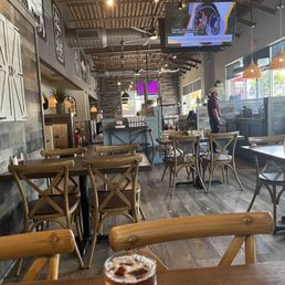 Looking now the narrow center of the restaurant / tables and booths a bit packed in!