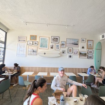 Grove Surf + Coffee - The art displayed on the walls - Coffee & Tea Near Me - St. Pete Beach, Florida