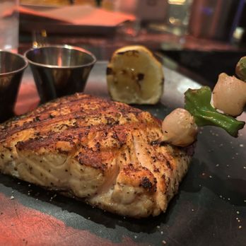 The Beast - Grilled salmon with honey and melted butter on the side - New American Near Me - Las Vegas, Nevada The Beast - Grilled salmon with honey and melted butter on the side - New American Near Me - Las Vegas, Nevada