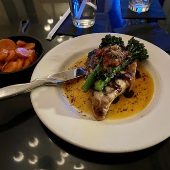 Iconic - Bone in Pork Chop - Cocktail Bars Near Me - Utica, New York Iconic - Bone in Pork Chop - Cocktail Bars Near Me - Utica, New York