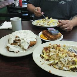 a man eating breakfast a man eating breakfast
