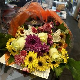 The bouquet he created for my friend!!! The green roses were so beautiful all the colors blended so well! The bouquet he created for my friend!!! The green roses were so beautiful all the colors blended so well!