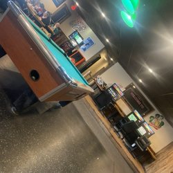 Backwoods Bar & Grill of Burt - Interior. Very open so a little loud