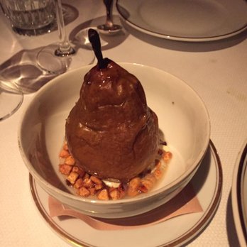 Le Coucou - pear roasted in Muscadet wine, vanilla ice cream, almond dragée - French Near Me - New York, New York