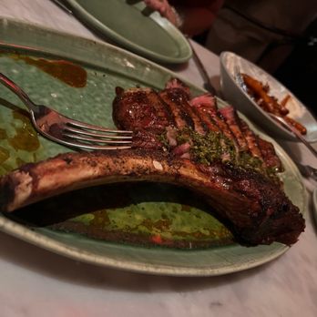 Death & Taxes - Tomahawk special... last one, well prepared, a bit undercooked at Med Rare... more like rare... but sizable. - New American Near Me - Raleigh, North Carolina