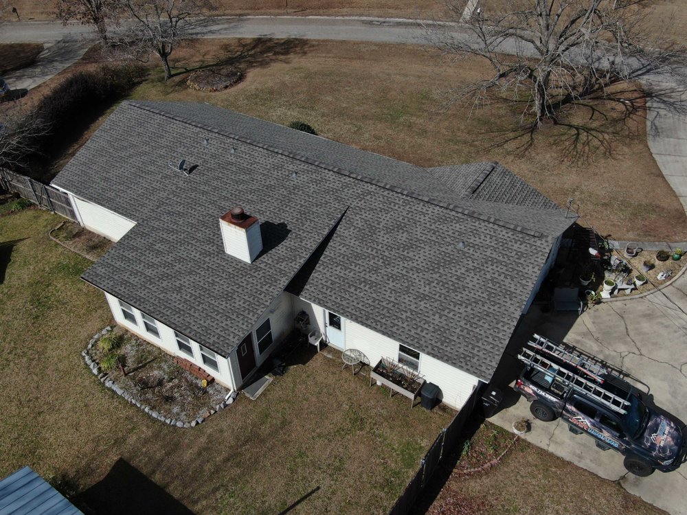 Slide of JMR Roofing