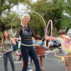 Yoga with Katie - Katie hula hooping with the pubic at a local event