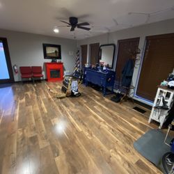 Idaman Barber - Inside the shop . Justin - blue station Aaron - black station