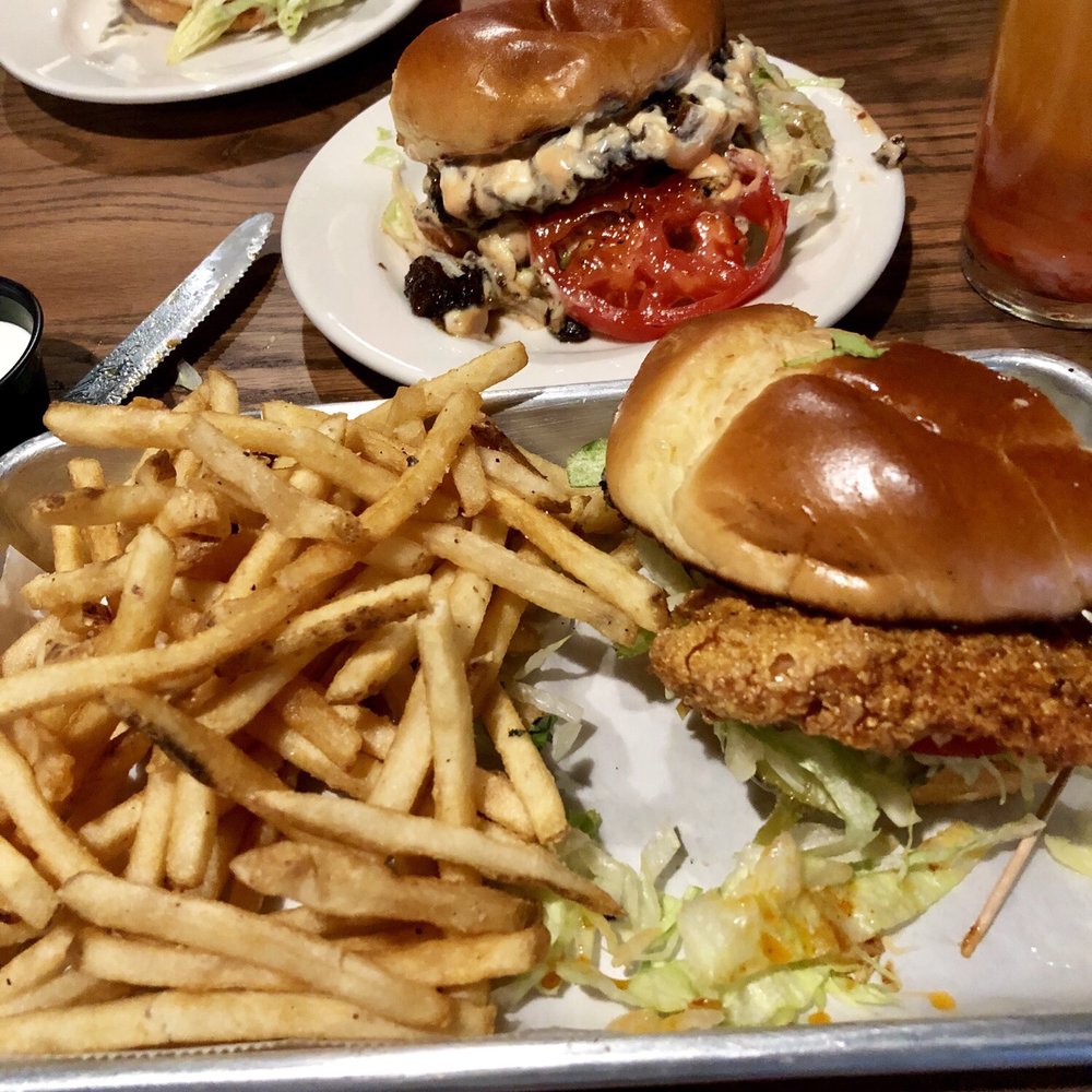 Squid Ink Eclectic Eats & Drinks - When you want 2 menu items you split them with your husband- hot chicken sandwich and a Cadillac burger! - Gastropubs Near Me - Mobile, Alabama Squid Ink Eclectic Eats & Drinks - When you want 2 menu items you split them with your husband- hot chicken sandwich and a Cadillac burger! - Gastropubs Near Me - Mobile, Alabama