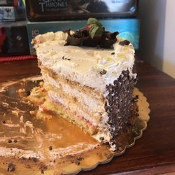 Pelligra Cakes - Unsweetened cream. Way too much. Dry chocolate crumbs on the outside. More cream than cake which no one ate.