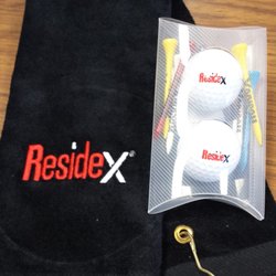 New England Embroidery - Embroidered golf towels & customized golf balls & tees that we did for a Residex customer.
