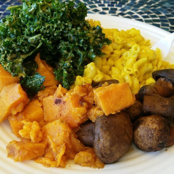 Kale Cafe Juice Bar & Vegan Cuisine - This is the Vegan plate. Kale salad was BOMB. Mushrooms were surprisingly spicy. Yams were yams. "Mac N Sheese" was ok. - Vegan Near Me - Daytona Beach, Florida Kale Cafe Juice Bar & Vegan Cuisine - This is the Vegan plate. Kale salad was BOMB. Mushrooms were surprisingly spicy. Yams were yams. "Mac N Sheese" was ok. - Vegan Near Me - Daytona Beach, Florida