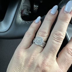 Martin's Jewelry - Channel set set anniversary band with a delicate mil-grained edge in White Gold.