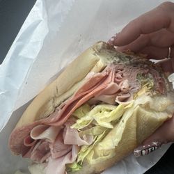 Post Road News & Deli - Bologna,Salami, Delux Ham, lettuce, tomato, sweet peppers, pesto mayo, and balsamic Sub!
